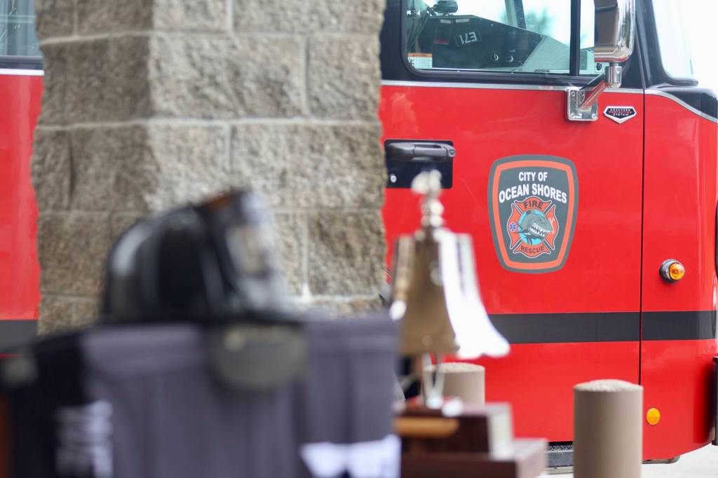 Michael S. Lockett / The Daily World
Firefighters and residents gathered Wednesday at the Ocean Shores Fire Department to remember 9/11.