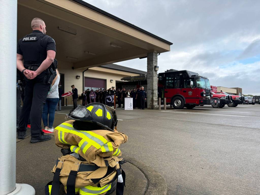 Michael S. Lockett / The Daily World
A set of empty bunker gear symbolizes the dead in a 9/11 ceremony of remembrance at the Ocean Shores Fire Department.