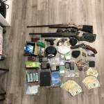 The Grays Harbor Drug Task Force seized a goodly amount of drugs, cash and multiple firearms during a raid on an Aberdeen apartment Wednesday. (Courtesy photo / GHDTF)