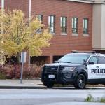 An Aberdeen police vehicle is one of the more visible components in the response after school administrators raised the security levels following a report that an unknown person was going to bring a gun to Aberdeen High School. (Michael S. Lockett / The Daily World)