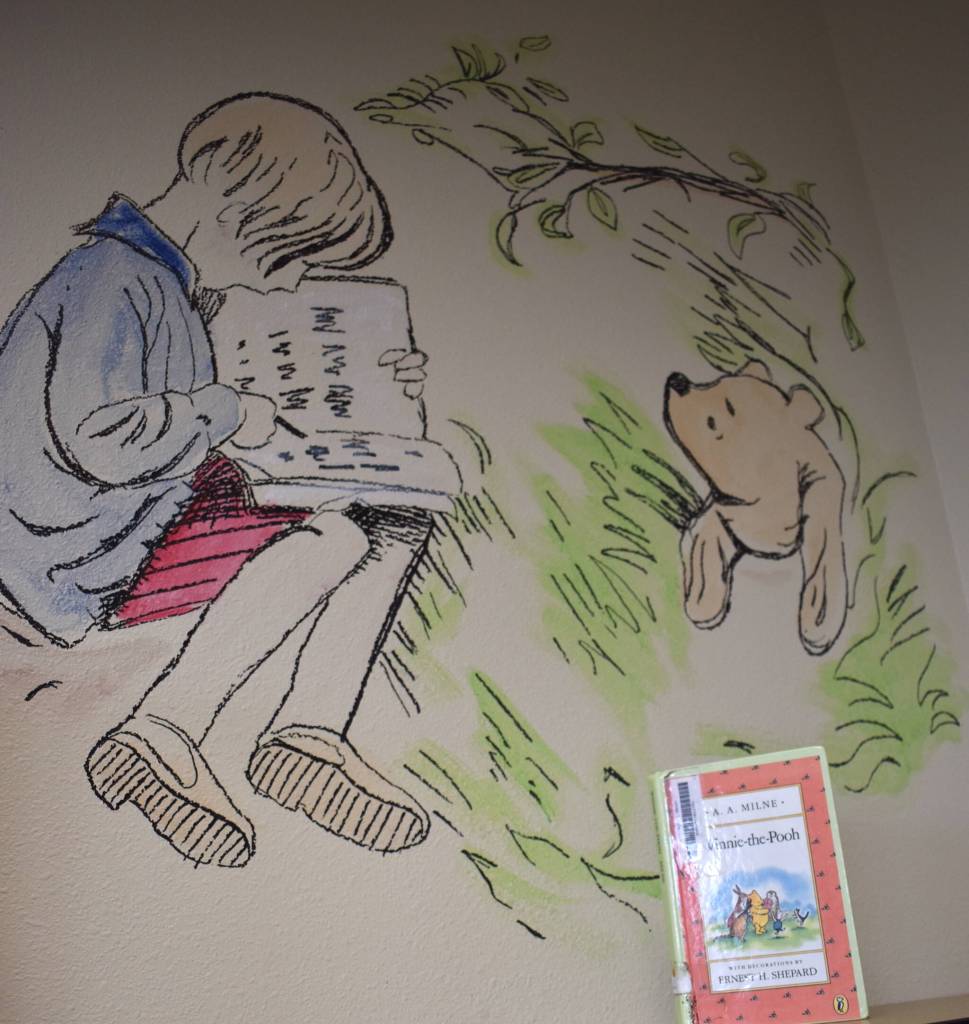 The artwork inside McDermoth Elementary School not only reaches the current generation of students with more contemporary books such as Creepy Carrots!, Pete the Cat, Elephant and Piggie, and more, it also shows off older literary characters, such as Winnie the Pooh, right, and Christopher Robin, left. (Matthew N. Wells / The Daily World)