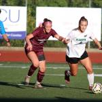 RYAN SPARKS | THE DAILY WORLD Montesanos Kennedy Campbell (left) pursues Klahowyas Macayla Wrataric during the Bulldogs 3-0 loss on Thursday at Montesano High School.