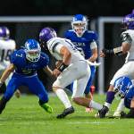PHOTO BY FOREST WORGUM Elmas Blaize Salazar (7) prepares to make a tackle during the Eagles 28-7 loss to Sequim on Friday at Davis Field in Elma.