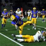 RYAN SPARKS | THE DAILY WORLD Aberdeen running back Legend Vessey (2) eludes the tackle of Rochester safety Carson Rotter (6) during a 33-7 loss on Friday at Stewart Field in Aberdeen.