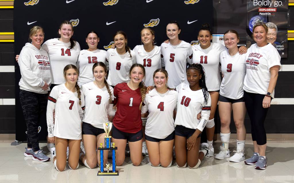 PHOTO BY PATTI REYNVAAN 
The Hoquiam Grizzlies pose with their first-place trophy after winning the North Beach Tournament on Saturday in Ocean Shores.