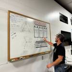 Michael S. Lockett / The Daily World
Craig McAlpin gestures at a transformer diagram at the Grays Harbor PUDs training center.