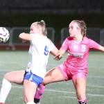 RYAN SPARKS | THE DAILY WORLD Elmas Miley Seaberg (9) gets to the ball ahead of Montesanos Sam Roundtree during the Bulldogs 2-0 win on Thursday at Jack Rottle Field in Montesano.