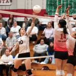 PHOTO BY VAN ADAM DAVIS Ocostas Veronica Gruber (10) puts a shot up over Taholahs Nono McCrory (14) during the Wildcats 3-0 win on Thursday in Taholah.