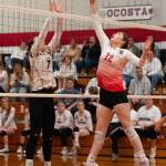 PHOTO BY VAN ADAM DAVIS Ocostas Jolissa Schlegel (7) and Taholahs Nayeli Ancheta (12) make a play at the net during the Wildcats straight-set victory on Thursday in Taholah.