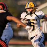 RIDLEY HUDSON | THE CHRONICLE Aberdeen running back Micah Schroeder (6) carries the ball during a 40-0 victory over Centralia on Saturday at Tiger Stadium in Centralia.