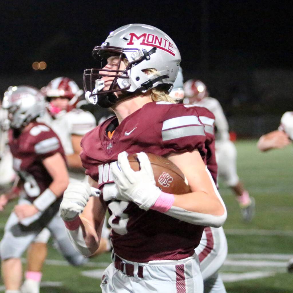 RYAN SPARKS | THE DAILY WORLD Montesanos Mason Fry returns a fumble for a touchdown during a 42-0 victory over Hoquiam on Friday at Montesano High School.