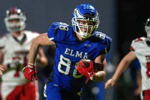 PHOTO BY FOREST WORGUM Elmas Traden Carter scores on an interception return during a 27-16 win over Tenino on Friday at Elma High School.