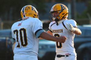 DAILY WORLD FILE PHOTO 
Aberdeens Micah Schroeder (right) and Andres Arias embrace during a game against Centralia on Oct. 12. The Bobcats face No. 1 Tumwater on Friday in Aberdeen.