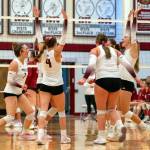 PHOTO BY FOREST WORGUM The Montesano Bulldogs celebrate a point during a straight-set victory over Hoquiam on Thursday at Hoquiam High School.