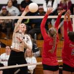 PHOTO BY VAN ADAM DAVIS Ocosta hitter Jolissa Schlegel (left) shoots against Willapa Valley defenders Tylar Keeton (7) and Rilyn Channell during the Wildcats 3-1 win on Thursday at Ocosta High School.