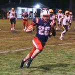 DYLAN WILHELM | THE CHRONICLE PWV running back Cody Strozyk races up the sideline during a 34-6 win over Forks on Friday in Pe Ell.