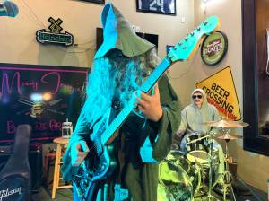 Matthew N. Wells / The Daily World
Bandet Spouk plays during the night portion of Walk of the Undead at Messy Jessys Bar and Grill in Downtown Aberdeen.