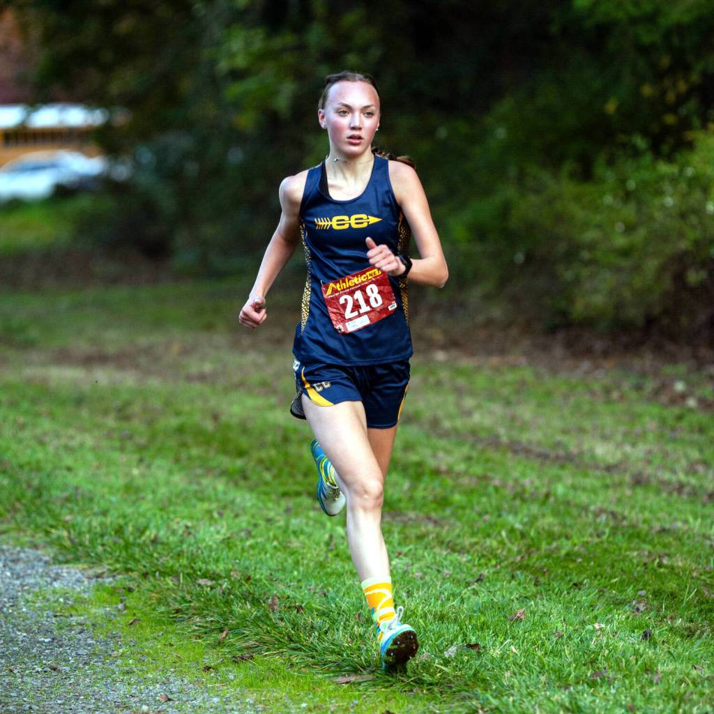 ALICIA TISDALE | ALICIATISDALE.COM Aberdeens Ailyn Haggard runs out in front en route to a victory in the girls 5K varsity race at the 2A Evergreen Conference Championships on Wednesday in Tumwater.