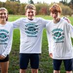 ALICIA TISDALE | ALICIATISDALE.COM Miller Junior High School runners (from left) Adalyn Friberg, Oliver Cech and Trenton George pose for a photo after earning all-league honors at the 2A Evergreen Conference Championships on Wednesday in Tumwater.