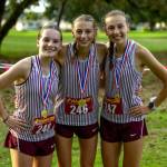PHOTO BY FOREST WORGUM Montesanos Zoe Ray (left), Haley Schweppe (middle) and Samantha Schweppe placed in the top three to lead Montesano to a team victory at the 1A Evergreen League Championships on Thursday at Oaksridge Golf Course in Elma.