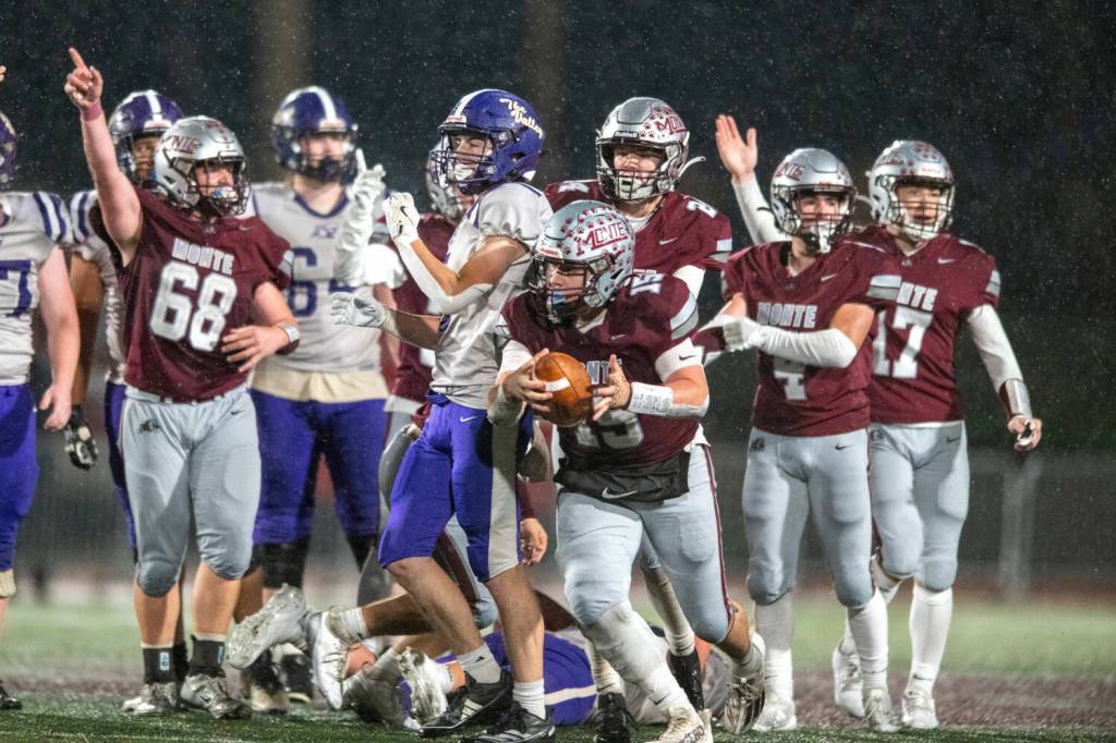 PHOTO BY FOREST WORGUM Montesano linebacker Felix Romero (15) recovers a fumble in the fourth quarter of a 34-28 win over Nooksack Valley on Friday at Jack Rottle Field in Montesano.
