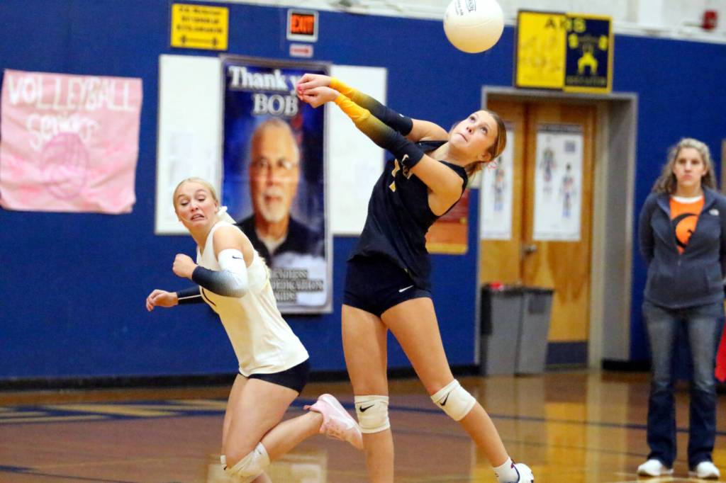 RYAN SPARKS | THE DAILY WORLD Aberdeen libero Sophie Knutson (right) digs a Tumwater shot while teammate Zoe Vessey looks on during a 3-0 loss to Tumwater on Thursday at Sam Benn Gym in Aberdeen.