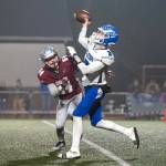 PHOTO BY FOREST WORGUM Elma quarterback Isaac McGaffey (3) is pressured by Montesano linebacker Christian Morris during the Bulldogs 45-0 win on Friday at Montesano High School.