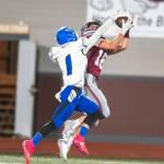 PHOTO BY FOREST WORGUM Montesano wide receiver Mason Rasmussen (18) hauls in a catch against Elma defensive back Ethan Camus during the Bulldogs 45-0 win on Friday in Montesano.