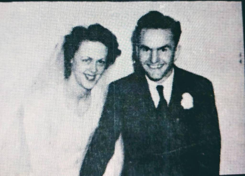 Howard, pictured with his wife after getting married upon returning from the war.