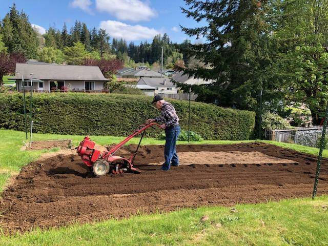 Howard still rototills his own garden.