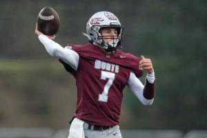 PHOTO BY FOREST WORGUM Montesano quarterback Tyson Perry throws a pass during a 49-6 win over Colville in the first round of the 1A State playoffs on Saturday at Montesano High School.