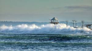 mycoast.org / Stefanie Baltzell
A king tide washes over the watch tower in Westport on Nov. 25 last year, about a half hour before high tide.