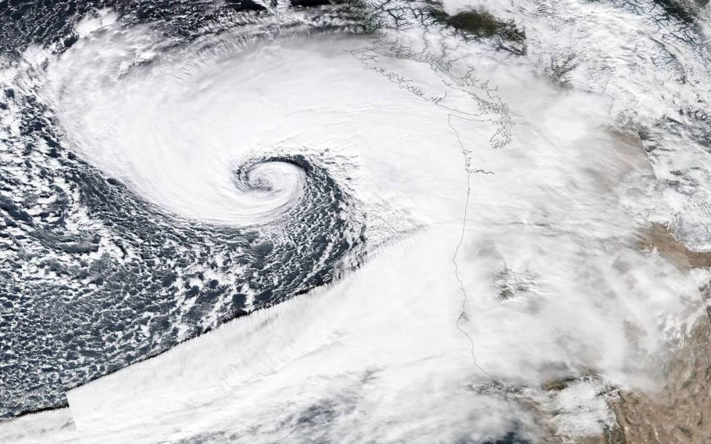 Courtesy of NASA
The bomb cyclone strengthens off Washingtons coast on Tuesday. Pressure dropped 27 millibars in six hours, about four times faster than the rate meteorologists use to label storms as bomb cyclones and in a fraction of the normal time span. It dropped so far and so fast that, under one method of analysis, it landed in a category reserved for the strongest of its kind: A super explosive cyclone.