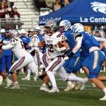 RYAN SPARKS | THE DAILY WORLD Montesanos Toren Crites (12) runs through the La Center defense during a 21-10 win in a 1A State Football quarterfinal game on Saturday at Woodland High School.