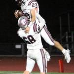 RYAN SPARKS | THE DAILY WORLD Montesano receiver Marcus Hale (23) celebrates with lineman Kyle Caton after catching a touchdown pass in the second half of a 35-14 loss to Seton Catholic in the 1A State semifinals on Saturday in Vancouver.
