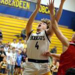 RYAN SPARKS | THE DAILY WORLD Aberdeen senior Tarren Lewis (4) drives to the hoop during an 85-50 season-opening loss to R.A. Long on Tuesday at Aberdeen High School.