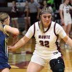 RYAN SPARKS | THE DAILY WORLD Montesano senior Ali Parkin (32) defends against Aberdeens Sophie Knutson during the Bulldogs 42-21 win on Thursday in Montesano. Parkins injury in the fourth quarter led to a premature ending to the contest.