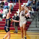 RYAN SPARKS | THE DAILY WORLD Montesanos Ava Schrader (22) shoots against Aberdeens Bentley Brown during the Bulldogs 42-21 win on Tuesday in Montesano.