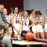 RYAN SPARKS | THE DAILY WORLD Ava Schrader (22) and the Montesano Bulldogs look on as teammate Ali Parkin is placed on a stretcher after suffering an injury in a 42-21 win over Aberdeen on Thursday at Montesano High School.