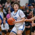PHOTO BY FOREST WORGUM Elmas Tanner Moe gave the Eagles the lead with a free throw late in the Eagles 67-62 win over Raymond-South Bend on Friday in Elma.