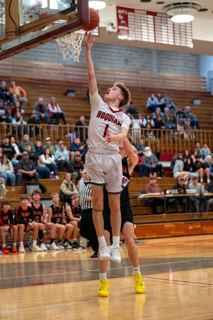 PHOTO BY FOREST WORGUM Hoquiam guard Ryker Maxfield (1) scores on a layup during a 65-49 win over Kalama on Wednesday in Hoquiam.