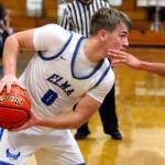 RYAN SPARKS | THE DAILY WORLD
Elma senior guard Traden Carter looks to drive during a 67-48 loss to Forks on Friday in Elma.