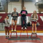 SUBMITTED PHOTO Aberdeens 130-pound weight-class winner Felicia Bell (second from right) poses for a photo with (from left) Hoquiams Sophia Estrada, Montesanos Angelina Brunzie and Hoquiams Shye Hinchen at the Lady Bulldog Bash on Saturday in Montesano.