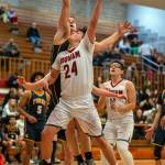 PHOTO BY FOREST WORGUM Hoquiams Lincoln Niemi (24) drives to the basket during a 62-39 loss to Forks on Monday at Hoquiam High School.