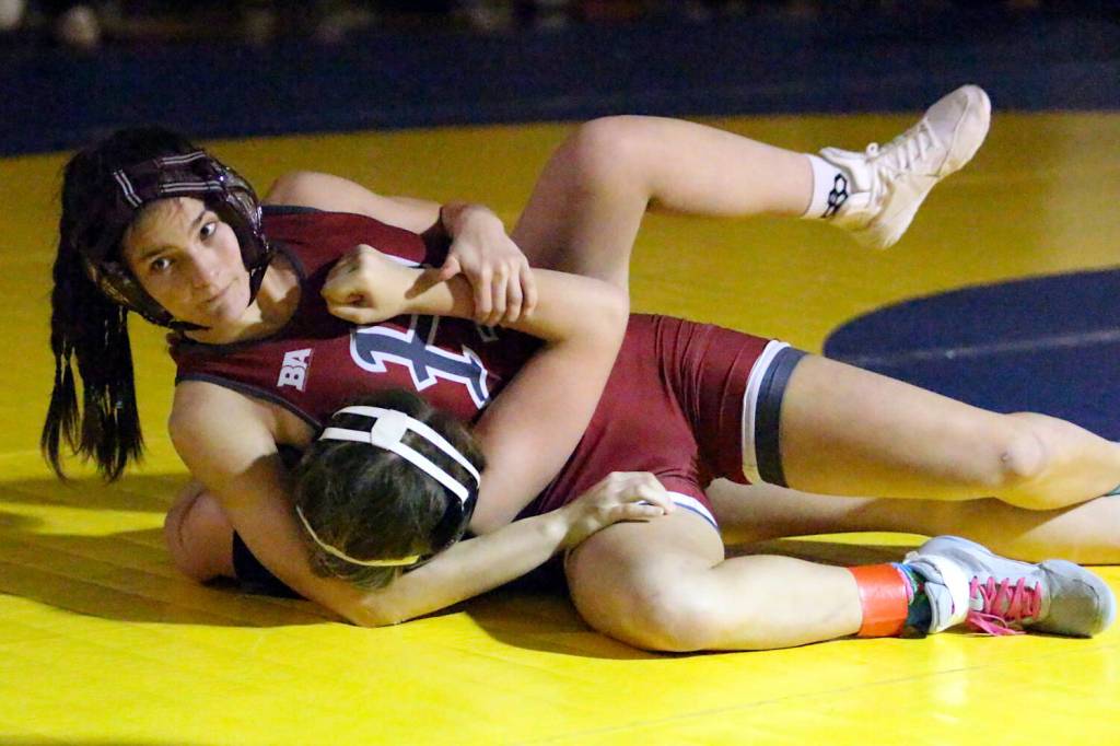RYAN SPARKS | THE DAILY WORLD
Hoquiam's Emily Brodhead (top) wrestles against Willapa Harbor's Mikayla Angelovich during the 120-pound finale at the Grays Harbor Championships on Saturday at Aberdeen High School.