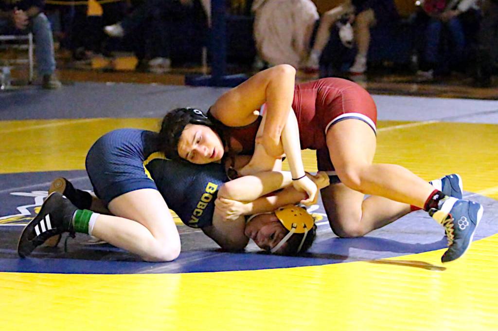 RYAN SPARKS | THE DAILY WORLD
Hoquiam's Meribel Mazariegos (right) grapples with Aberdeen Kayleen Rouska during the 145-pound title match at the Grays Harbor Championships on Saturday at Aberdeen High School.