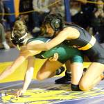 RYAN SPARKS | THE DAILY WORLD
North Beach senior Mayra Strandberg (right) gains control of Port Angeles' Lilly Lancaster during the 115-pound title match at the Grays Harbor Championships on Saturday at Aberdeen High School.