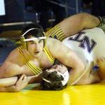 RYAN SPARKS | THE DAILY WORLD Aberdeens Landon Hamblin (top) works toward a pinfall win over North Thurstons Konner Jack during the 285-pound final at the Grays Harbor Championships on Saturday at Aberdeen High School.
