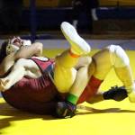 RYAN SPARKS | THE DAILY WORLD Hoquiams Kingston Case (bottom) suffers an ankle injury while wrestling Ocostas Ronin Rutzer during the 150-pound title match at the Grays Harbor Championships on Saturday at Aberdeen High School. Case would continue on to win the match 11-9.