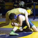 RYAN SPARKS | THE DAILY WORLD Aberdeens Michael Hatton (top) grapples with Willapa Harbors Lucas Swogger during the 165-pound final match at the Grays Harbor Championships on Saturday at Aberdeen High School.